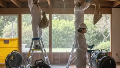 Water damage restoration team in Fremont, CA inspecting a damaged property for cleanup and repairs